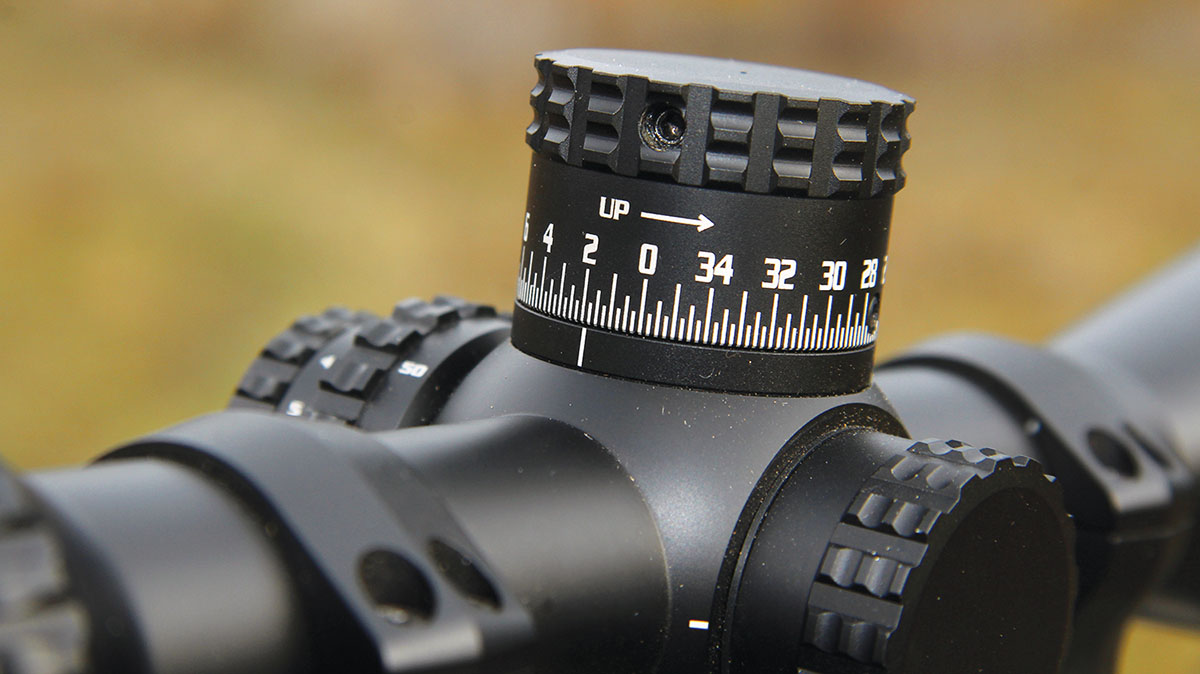 The scope includes an exposed elevation turret including a sensor that ties directly into the internal heads-up display, providing dialed-distance settings.